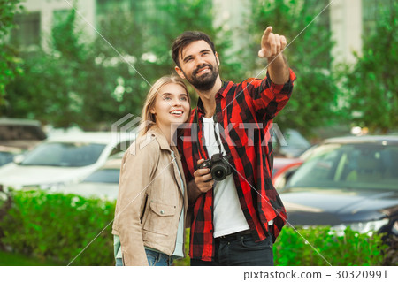 Young couple romantic city walk love relationship Young couple romantic city walk love relationship 30320991