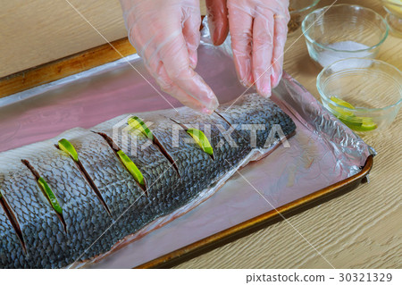marinated fish with lemon and onion dish the oven marinated fish with lemon and onion dish the oven 30321329