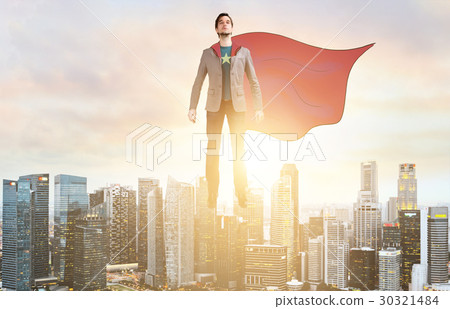 Business super hero hover over city skyline 30321484