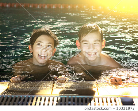 teenager boys in open air swimming pool 30321972