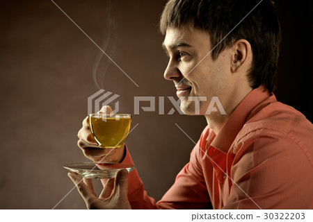 beautiful man with tea 30322203