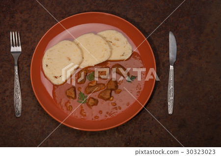 Traditional hungarian goulash wit dumplings 30323023