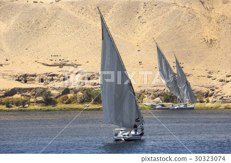 Felucca (river boat) on the Nile, with the Sahara Felucca (river boat) on the Nile, with the Sahara 30323074