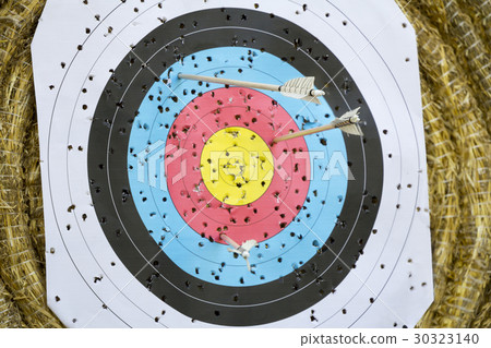 Archery Target With Arrows On a straw background Archery Target With Arrows On a straw background 30323140