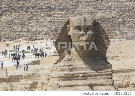 Closeup view of the Sphinx head with pyramid, Giza Closeup view of the Sphinx head with pyramid, Giza 30323235