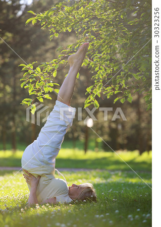 Yoga woman in park 30323256