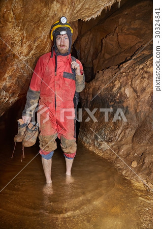 Caving barefoot in water Caving barefoot in water 30324841
