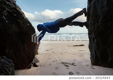 Climbing on rocks 30324843