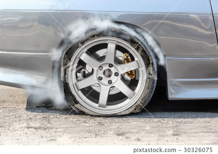 burst tire on the road 30326075