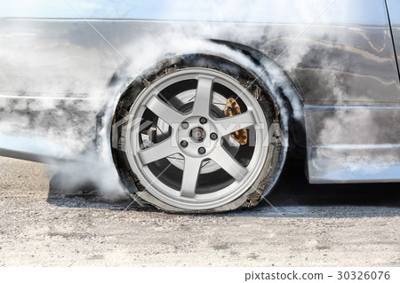 burst tire on the road 30326076