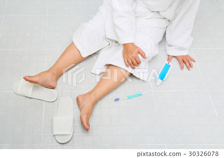 Woman falling in bathroom , slippery surfaces 30326078