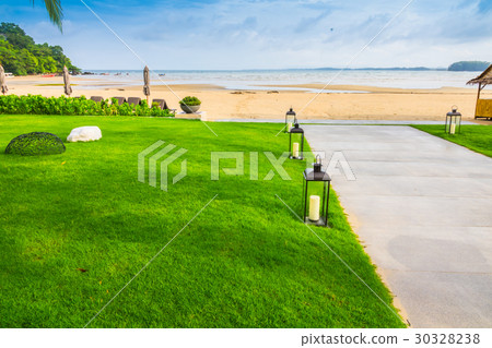 Beach and tropical sea . Beach and tropical sea . 30328238