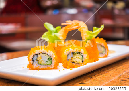 Japanese Sushi rolls with fresh raw salmon on white plate . Japanese Sushi rolls with fresh raw salmon on white plate . 30328555