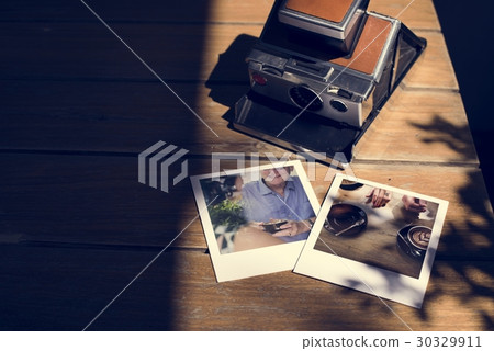 Messy pile of instant photo prints Messy pile of instant photo prints 30329911