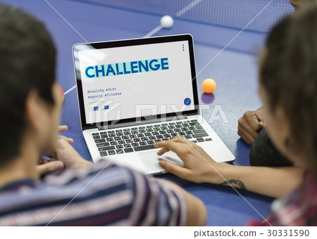 Students working on laptop network graphic overlay 30331590