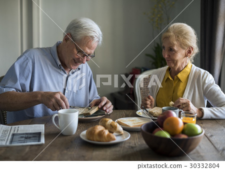 Senior Adult Couple Eat Breakfast Senior Adult Couple Eat Breakfast 30332804
