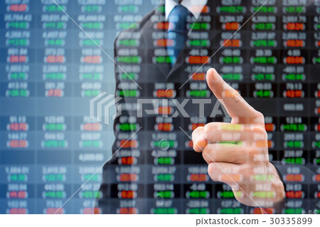 Double exposure businessman and stock market table 30335899
