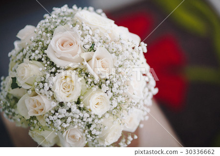 Wedding bouquet in hands of the bride. Wedding bouquet in hands of the bride. 30336662