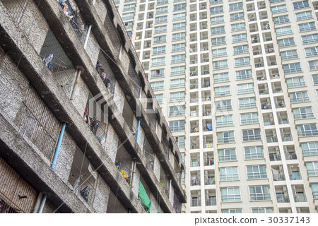 view from bottom of some buildings  30337143