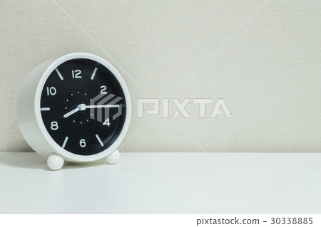 Closeup black and white alarm clock Closeup black and white alarm clock 30338885