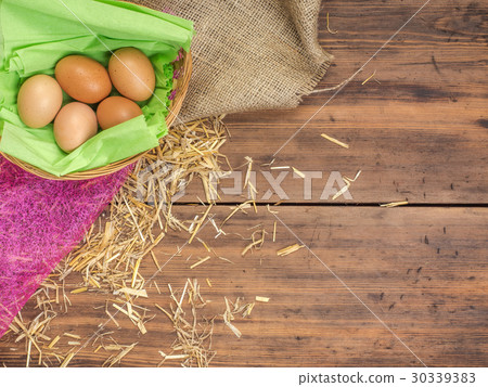 Rural eco background with brown chicken eggs, a Rural eco background with brown chicken eggs, a 30339383