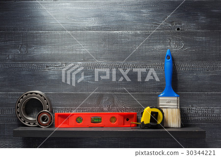 set of tools and instruments on shelf set of tools and instruments on shelf 30344221