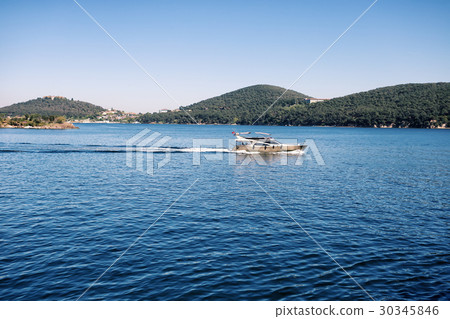 Boat sailing in the sea Boat sailing in the sea 30345846