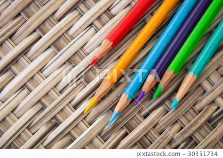 Wooden color pencils on a background of wicker 30351734