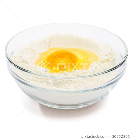 Flour with egg in glass bowl 30352805