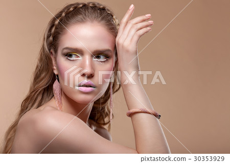 Portrait of a young woman with creative make-up 30353929