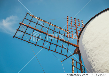 Windmill in cactus garden in Guatiza village Windmill in cactus garden in Guatiza village 30354586