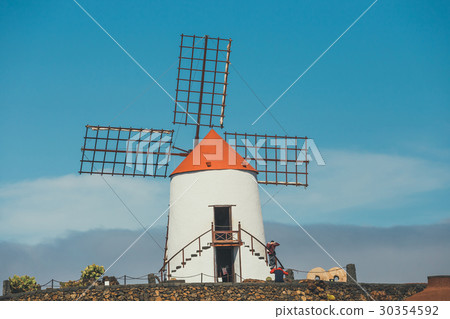 Windmill in cactus garden in Guatiza village 30354592