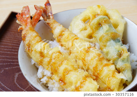 Bowl of rice and fried fish 30357116