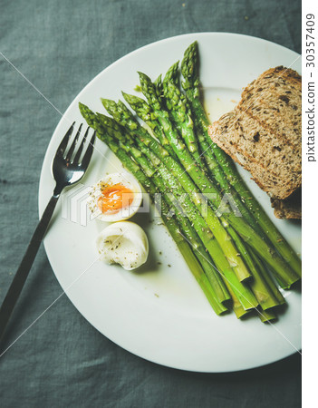 Cooked asparagus with soft-boiled egg, grilled Cooked asparagus with soft-boiled egg, grilled 30357409
