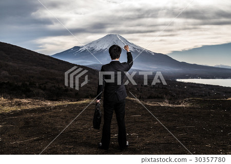 Businessman looking at the mountain, guts pose, victory 30357780