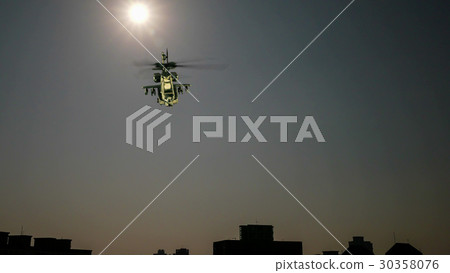 Helicopter flying above city Helicopter flying above city 30358076