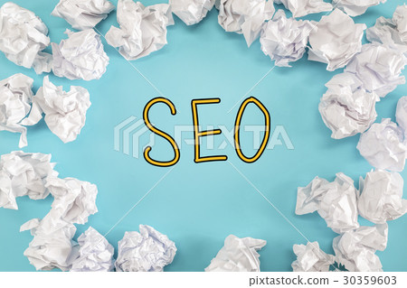 SEO text with crumpled paper balls 30359603