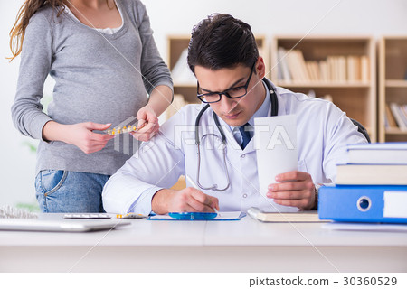 Pregnant woman visiting doctor for consultation Pregnant woman visiting doctor for consultation 30360529