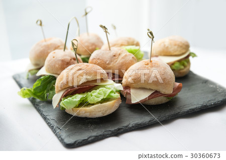 Mini sandwiches with salad, cheese, bacon and sala Mini sandwiches with salad, cheese, bacon and sala 30360673