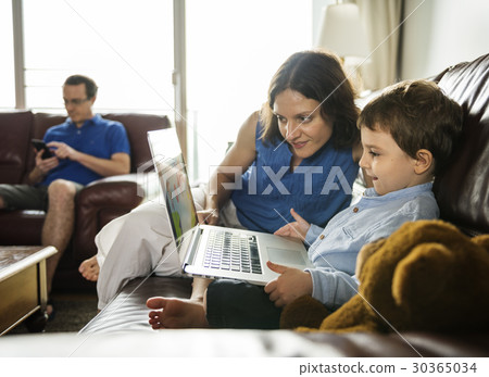 Caucasian Family Spend Time Holiday Together Using Laptop Relax 30365034