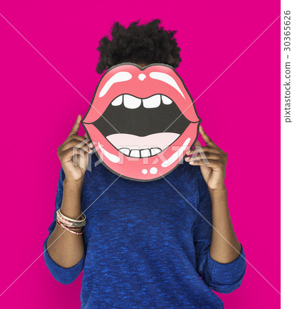 African Woman holding Peper Mouth Over her Face African Woman holding Peper Mouth Over her Face 30365626
