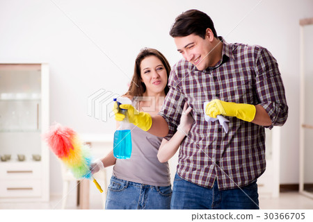 Wife and husband doing cleaning at home 30366705