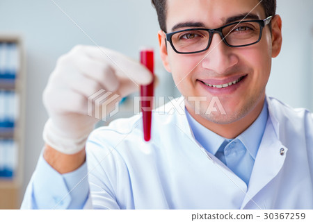 Doctor working with blood samples 30367259