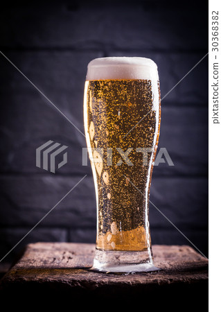 Glass of light beer 30368382