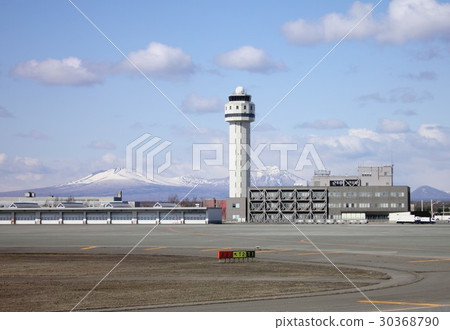 The entrance of Hokkaido, the control tower at Chitose Airport and the mountains in Donan which are visible in the background 30368790