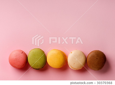 Macarons on pink 30370368