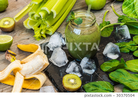Detox diet. Green smoothie with fruits 30370504