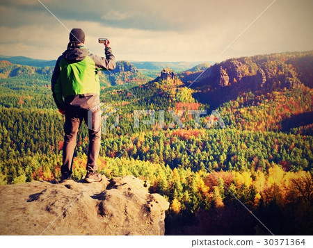 Tall adult photographer, camera take fall picture Tall adult photographer, camera take fall picture 30371364