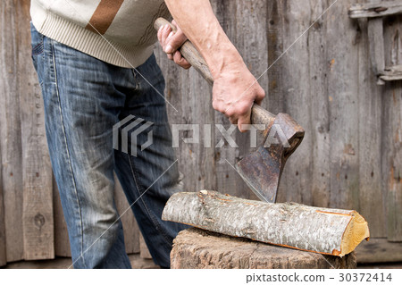 Worker, an elderly man with an old axe Worker, an elderly man with an old axe 30372414
