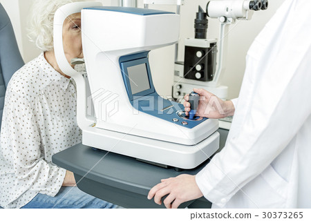 Old female patient in cabinet of doctor Old female patient in cabinet of doctor 30373265